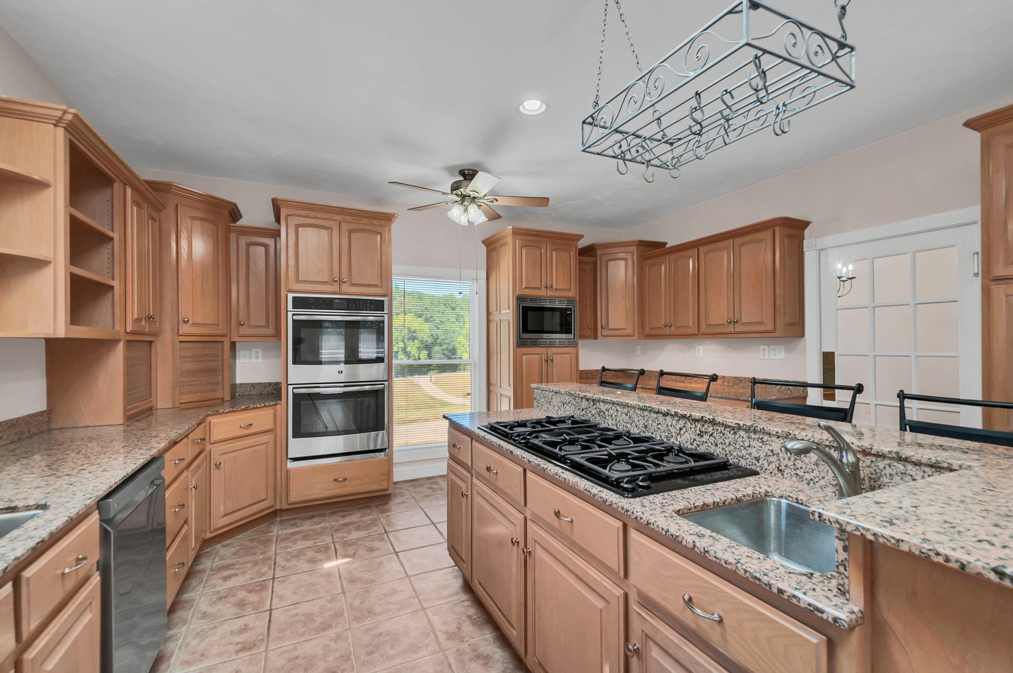 1400 Slaydenwood Road Cumberland Furnace, TN 37051 - Photo 28 of 58 a kitchen with a refrigerator and a sink