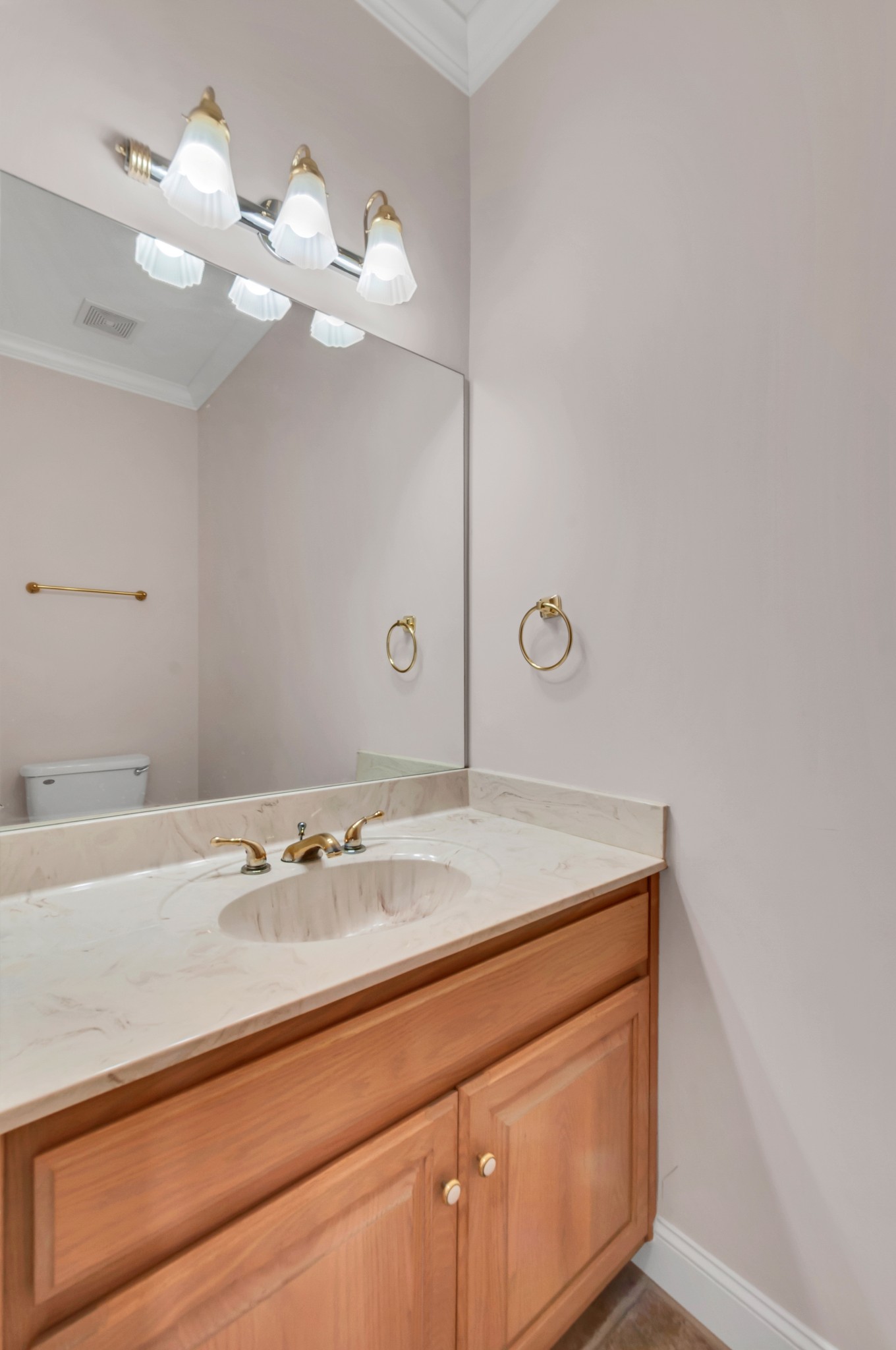 1400 Slaydenwood Road Cumberland Furnace, TN 37051 - Photo 33 of 58 a bathroom with a sink a mirror and a light fixture