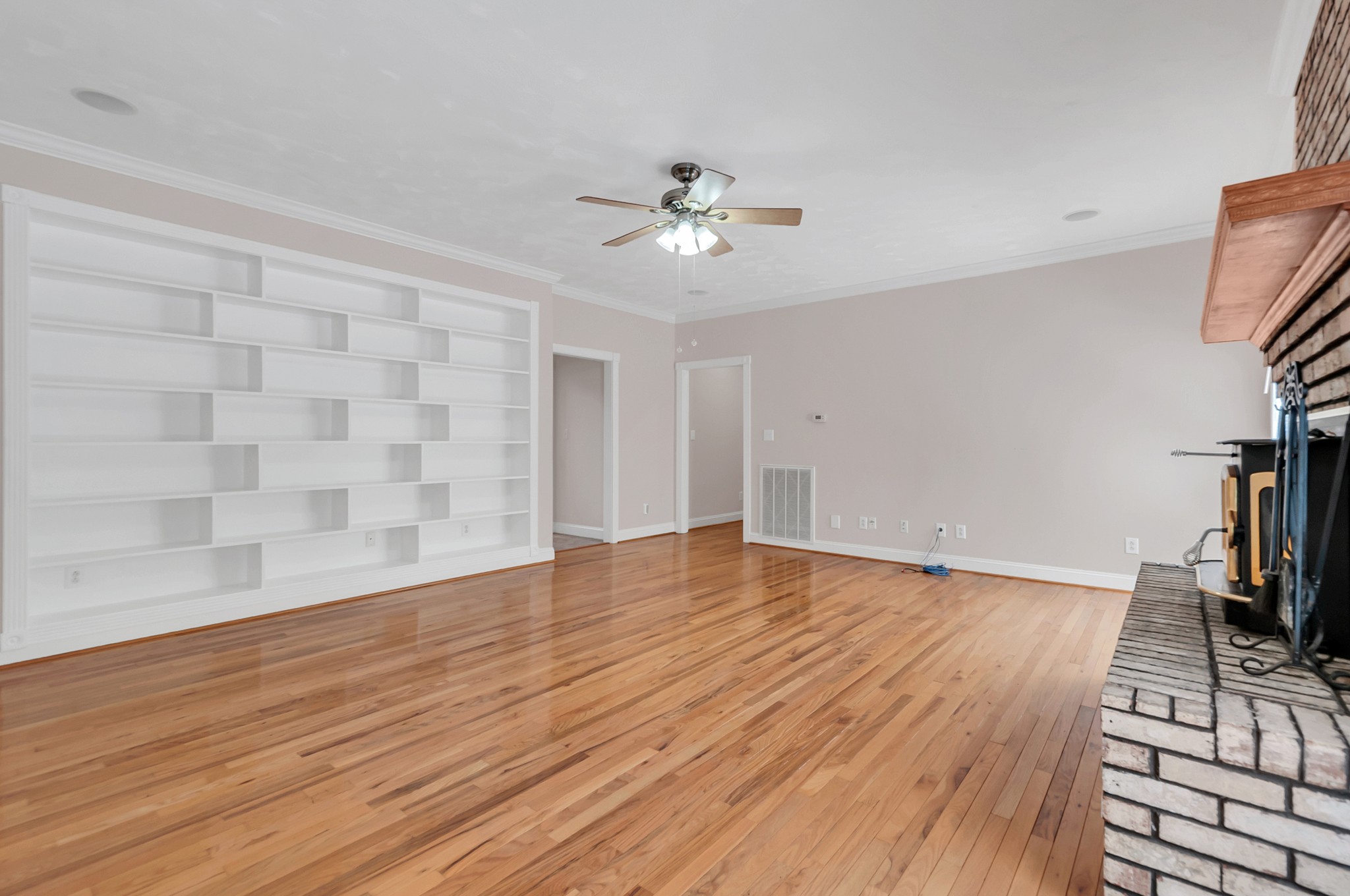 1400 Slaydenwood Road Cumberland Furnace, TN 37051 - Photo 34 of 58 a view of empty room with wooden floor and fan