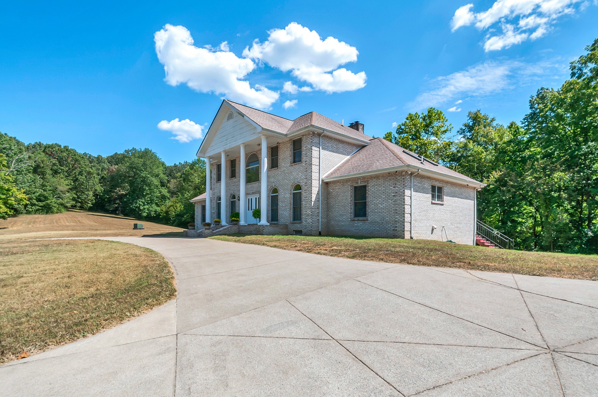 1400 Slaydenwood Road Cumberland Furnace, TN 37051 - Photo 44 of 58 a view of a house with a backyard