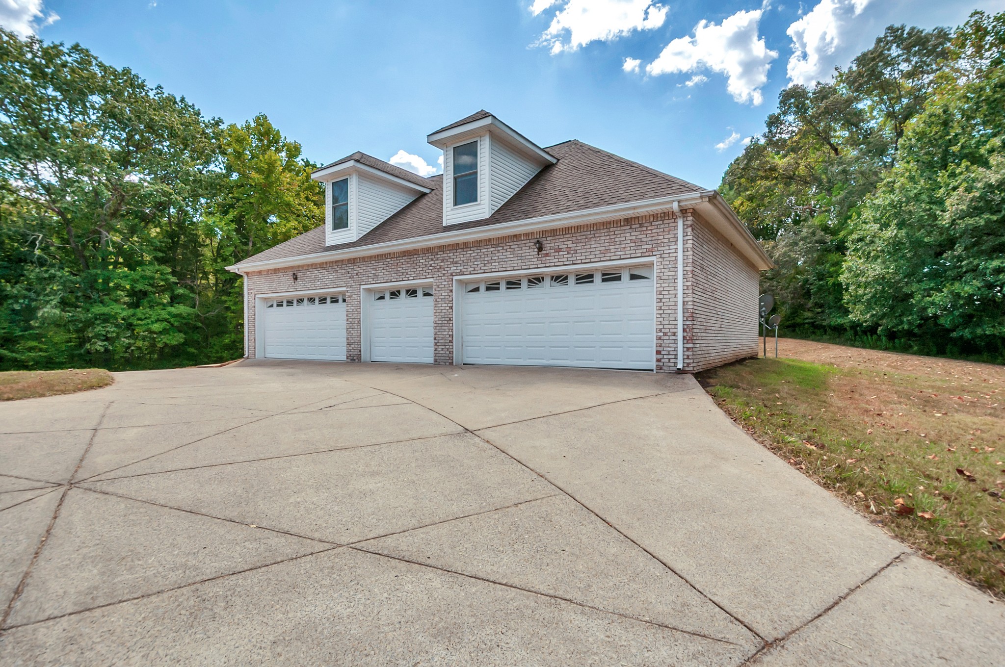1400 Slaydenwood Road Cumberland Furnace, TN 37051 - Photo 46 of 58 a view of a house with a garage
