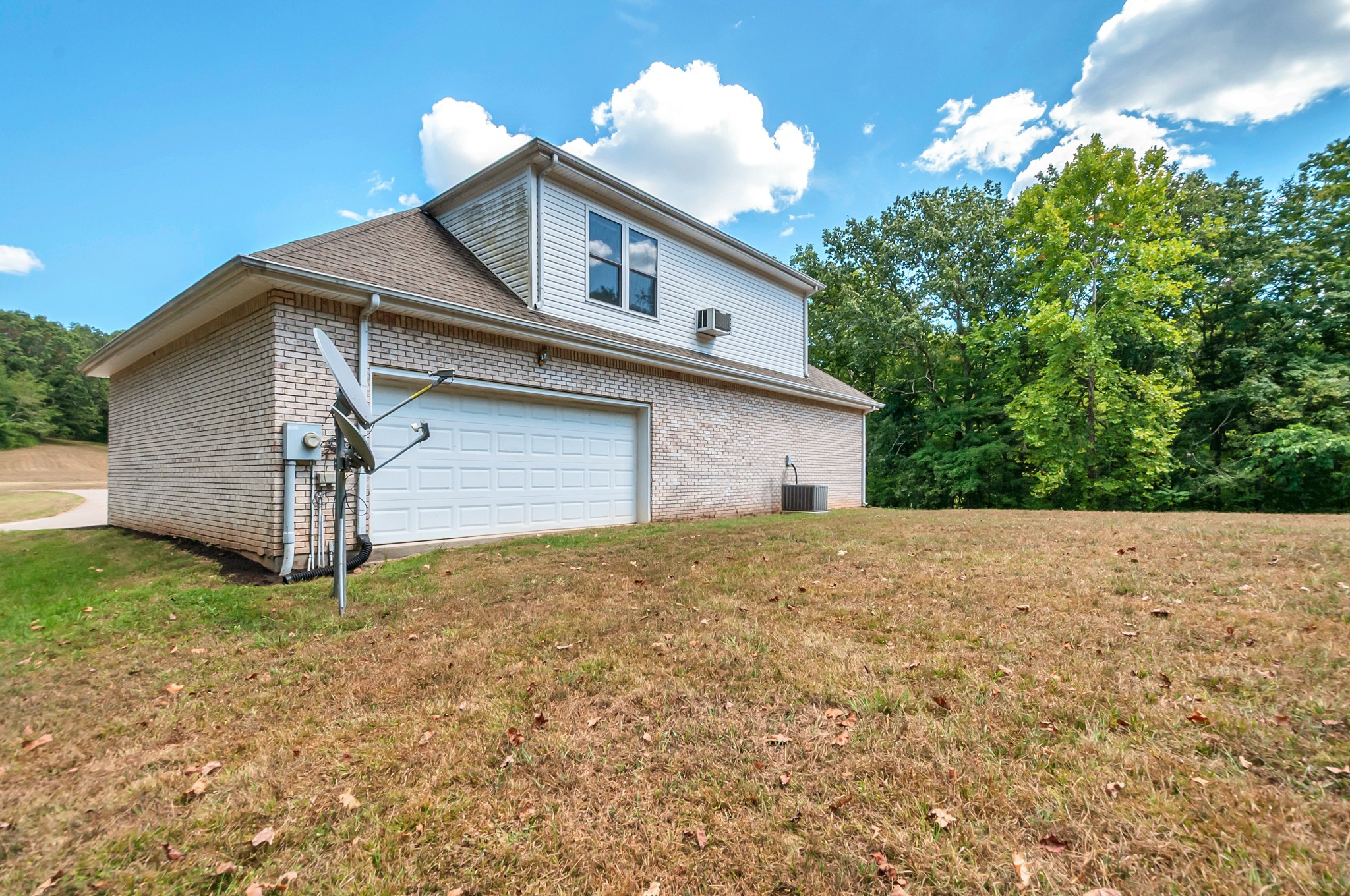 1400 Slaydenwood Road Cumberland Furnace, TN 37051 - Photo 47 of 58 a view of a house with a yard