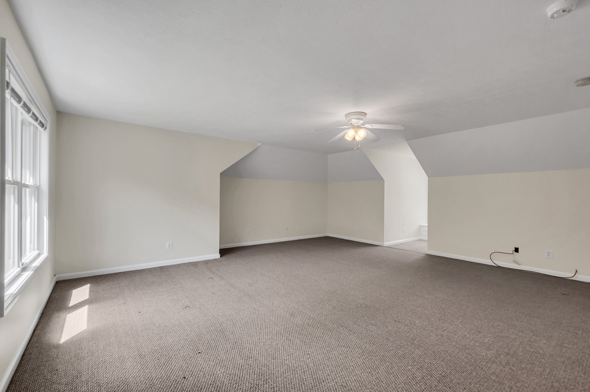 1400 Slaydenwood Road Cumberland Furnace, TN 37051 - Photo 50 of 58 an empty room with a ceiling fan and window