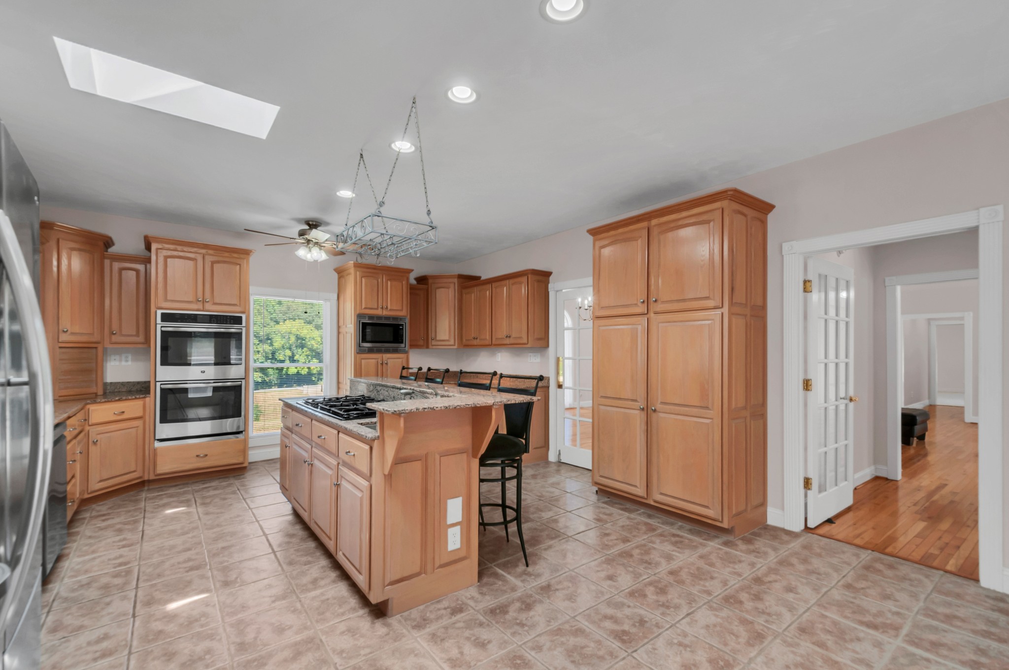 1400 Slaydenwood Road Cumberland Furnace, TN 37051 - Photo 7 of 58 a kitchen with stainless steel appliances granite countertop a stove oven and a refrigerator