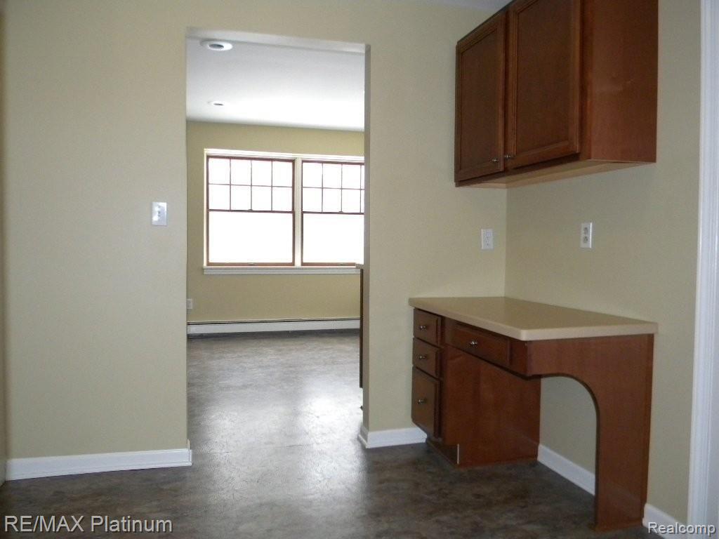 18049 Tipsico Lake Road Fenton, MI 48430 - Photo 8 of 25 Desk Area off Kitchen