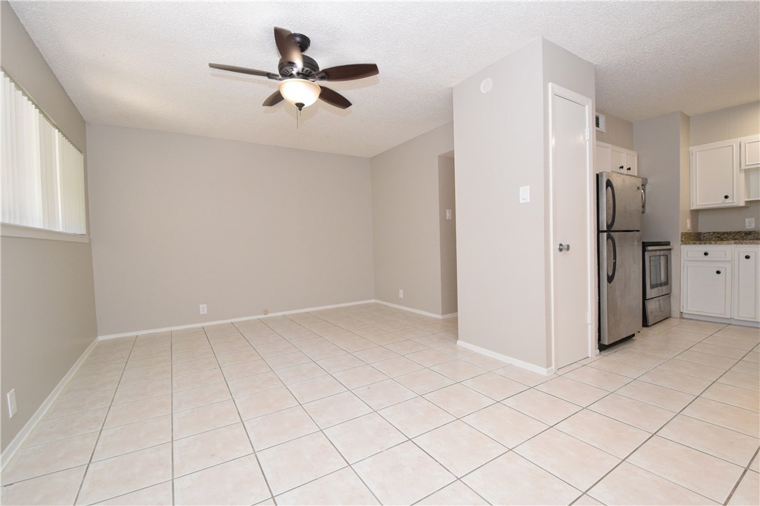 2404 Longview Street, Unit 103 Austin, TX 78705 - Photo 6 of 12 a view of an empty room and window