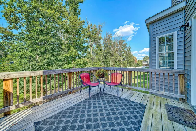 a view of balcony with furniture