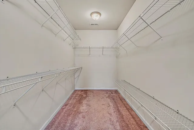 a view of a room with racks on the wall