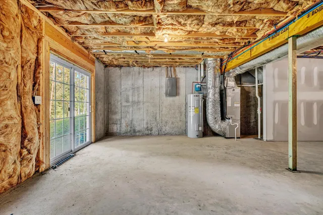a view of a room with wooden walls