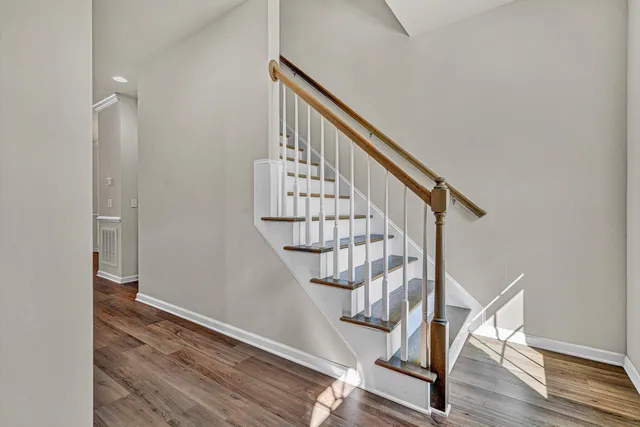 a view of entryway with wooden floor