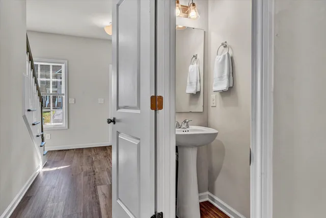 a bathroom with a sink and mirror
