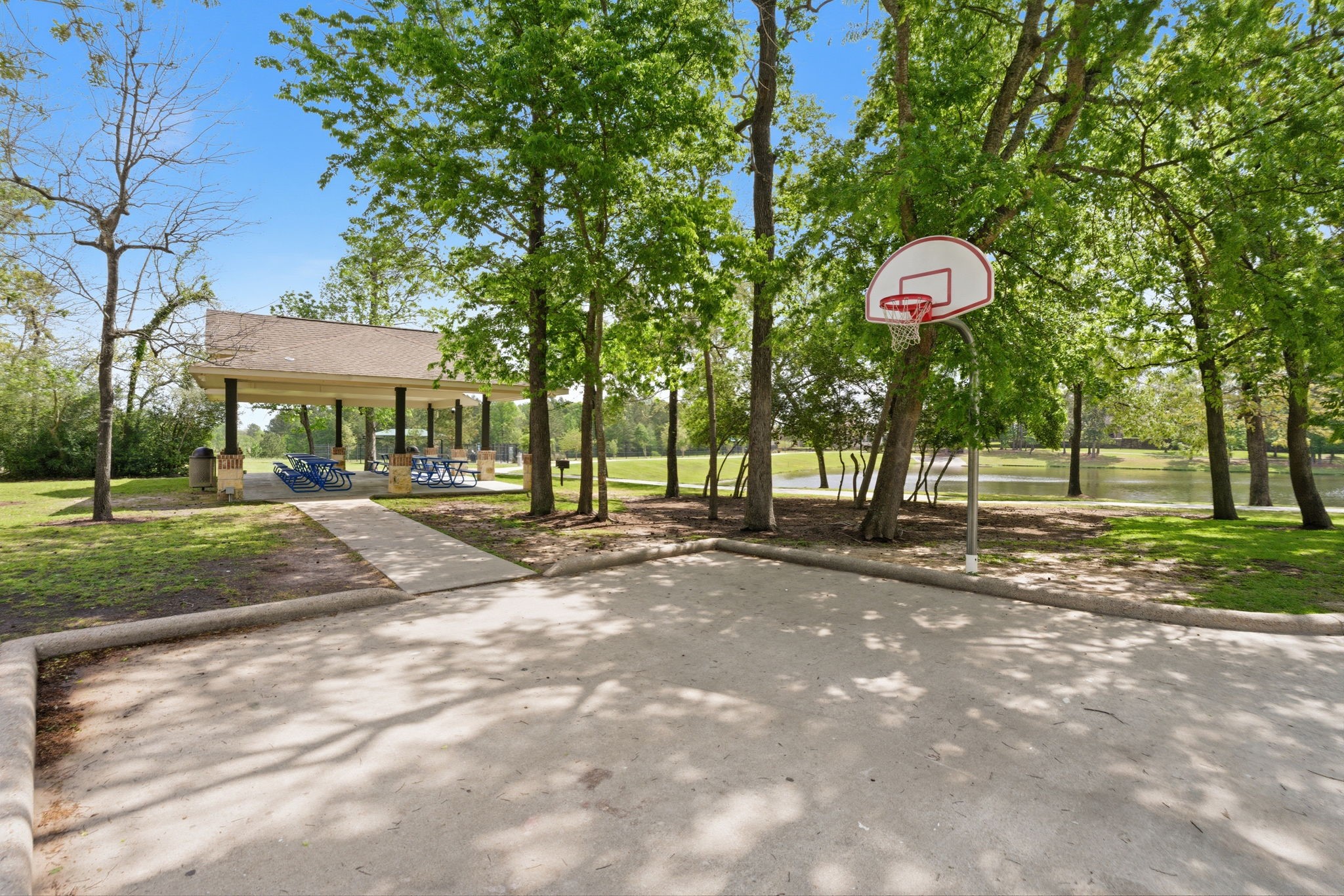 315 Arbor Ridge Lane Conroe, TX 77384 - Photo 43 of 48 a front view of a house with a yard