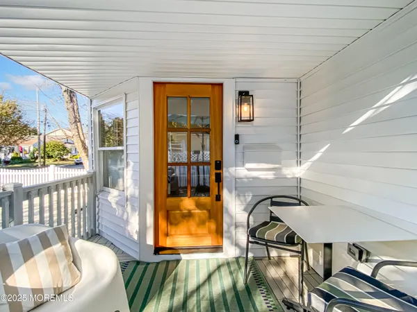 a bedroom with a bed and a potted plant