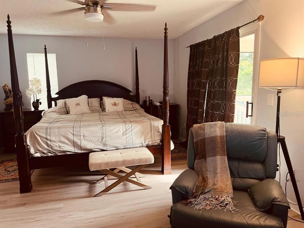 609 Prince Lane Oviedo, FL 32765 - Photo 15 of 20 a bedroom with furniture and a window