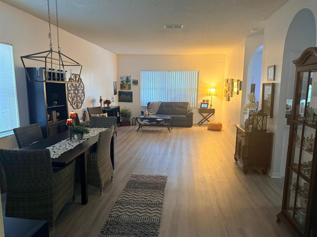 609 Prince Lane Oviedo, FL 32765 - Photo 3 of 20 a living room with furniture and a flat screen tv