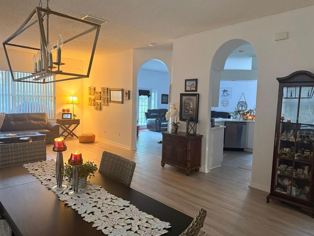 609 Prince Lane Oviedo, FL 32765 - Photo 4 of 20 a living room with furniture and a wooden floor