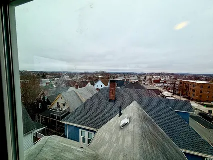 a view of a balcony with city view