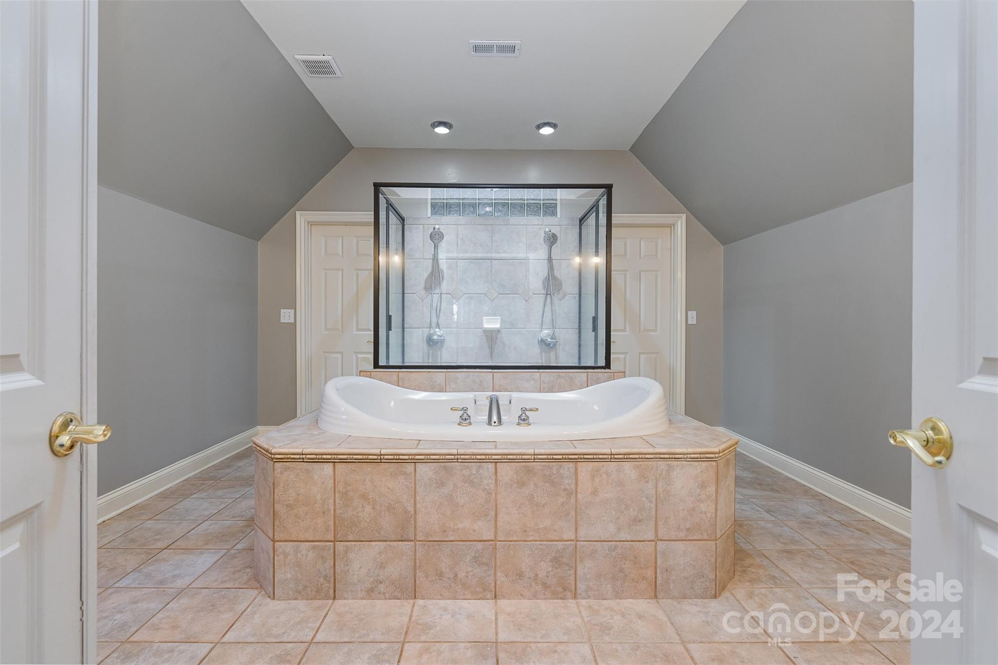 128 Mayfair Road Mooresville, NC 28117 - Photo 17 of 35 a bathroom with a bathtub