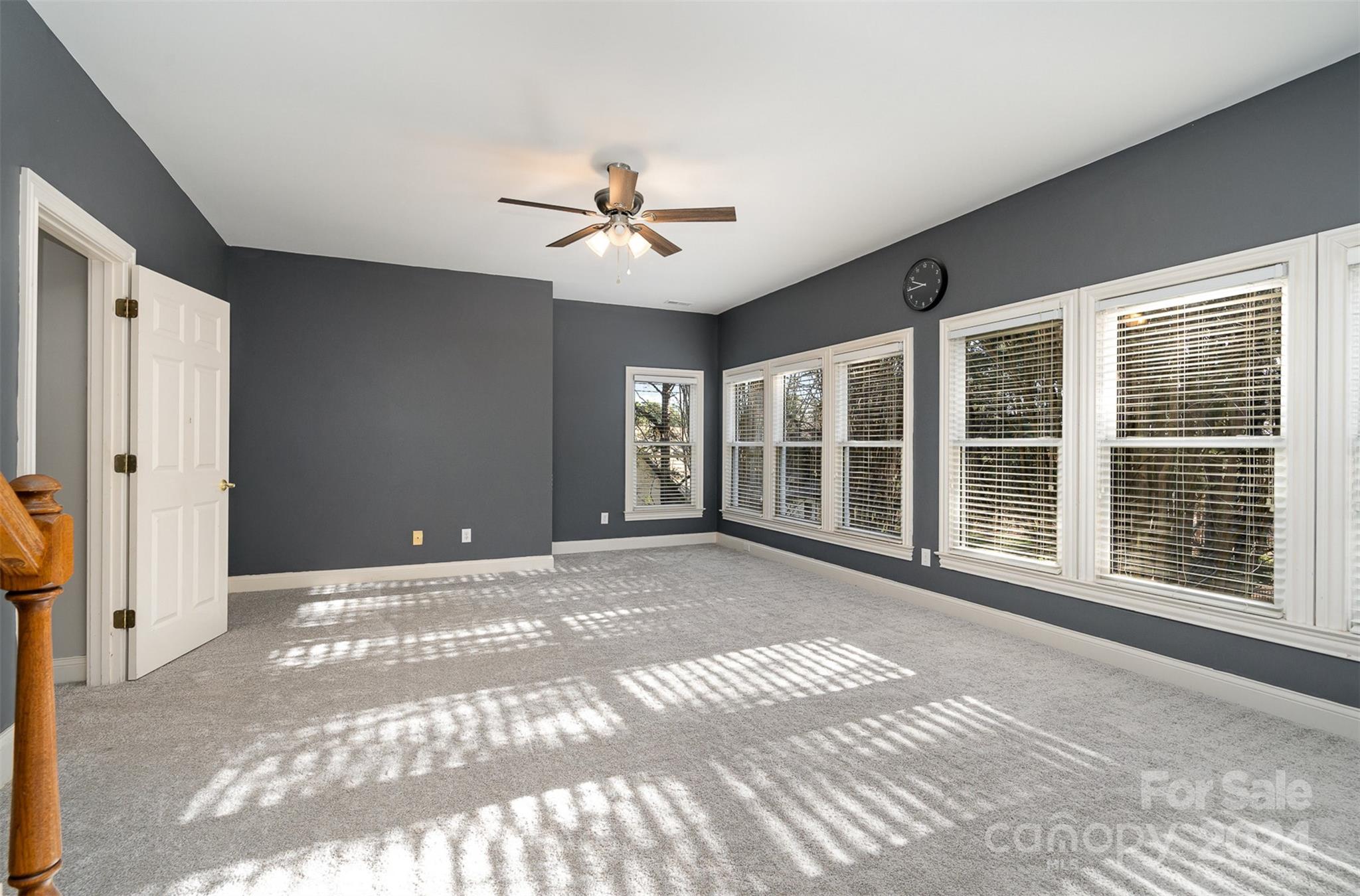 128 Mayfair Road Mooresville, NC 28117 - Photo 19 of 35 a view of empty room with windows