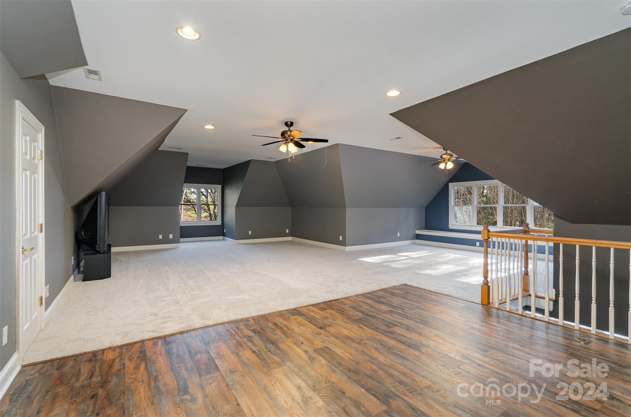 128 Mayfair Road Mooresville, NC 28117 - Photo 21 of 35 a view of a livingroom with wooden floor