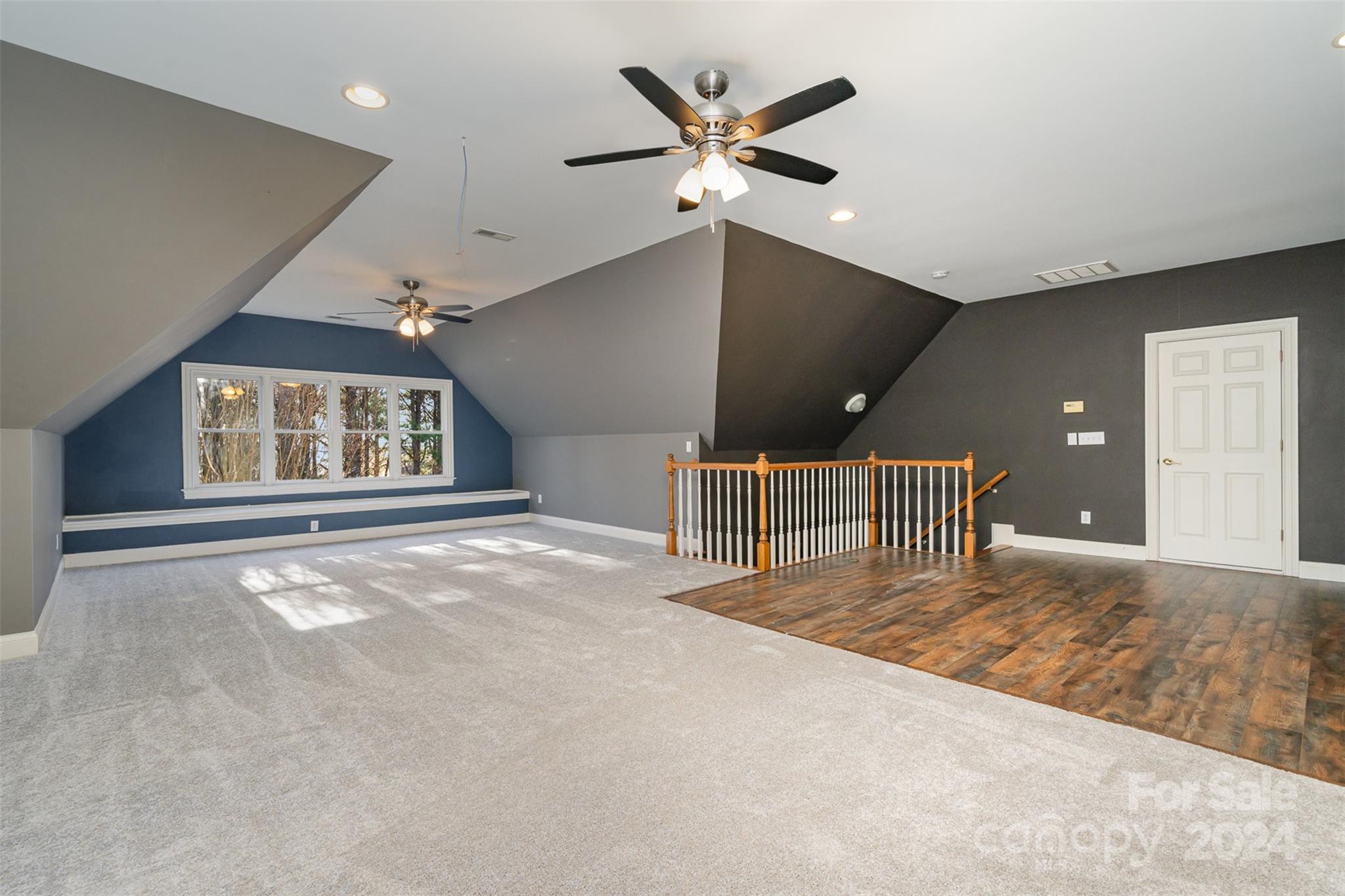 128 Mayfair Road Mooresville, NC 28117 - Photo 23 of 35 a view of an empty room with a window