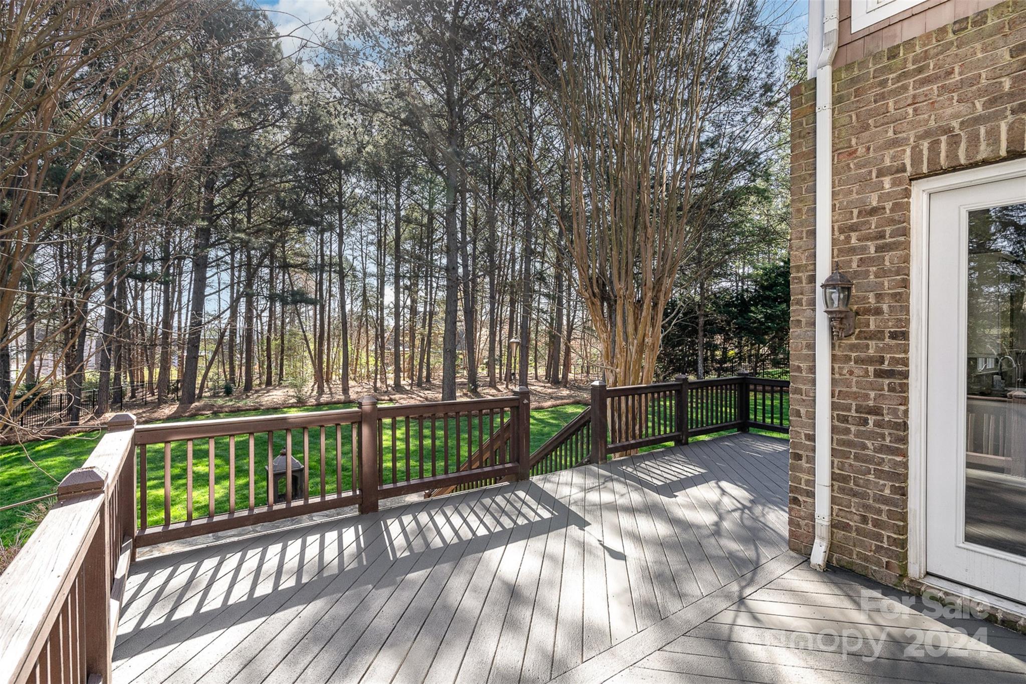 128 Mayfair Road Mooresville, NC 28117 - Photo 25 of 35 a view of a porch with a yard