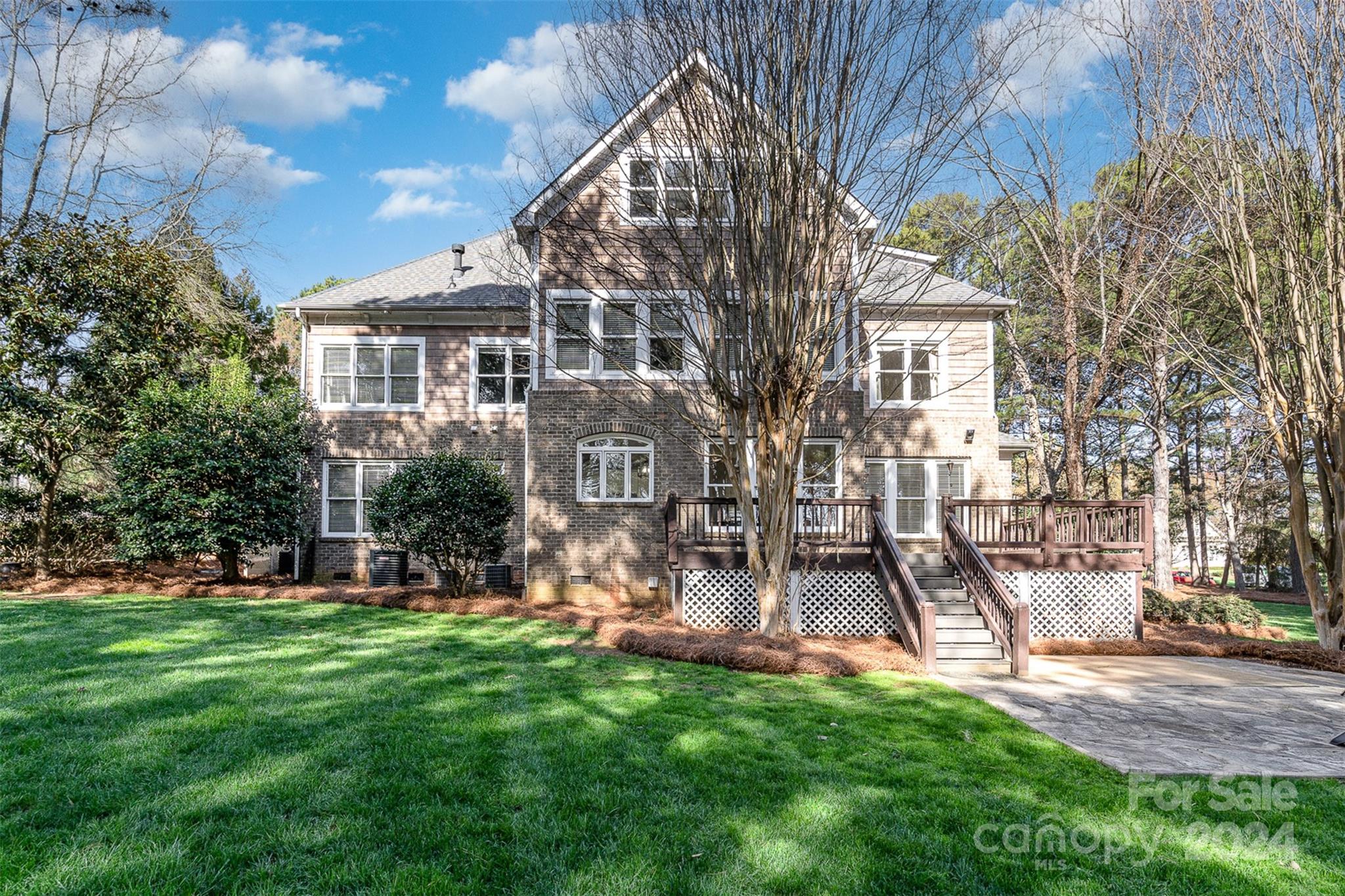 128 Mayfair Road Mooresville, NC 28117 - Photo 27 of 35 a view of a house with a yard