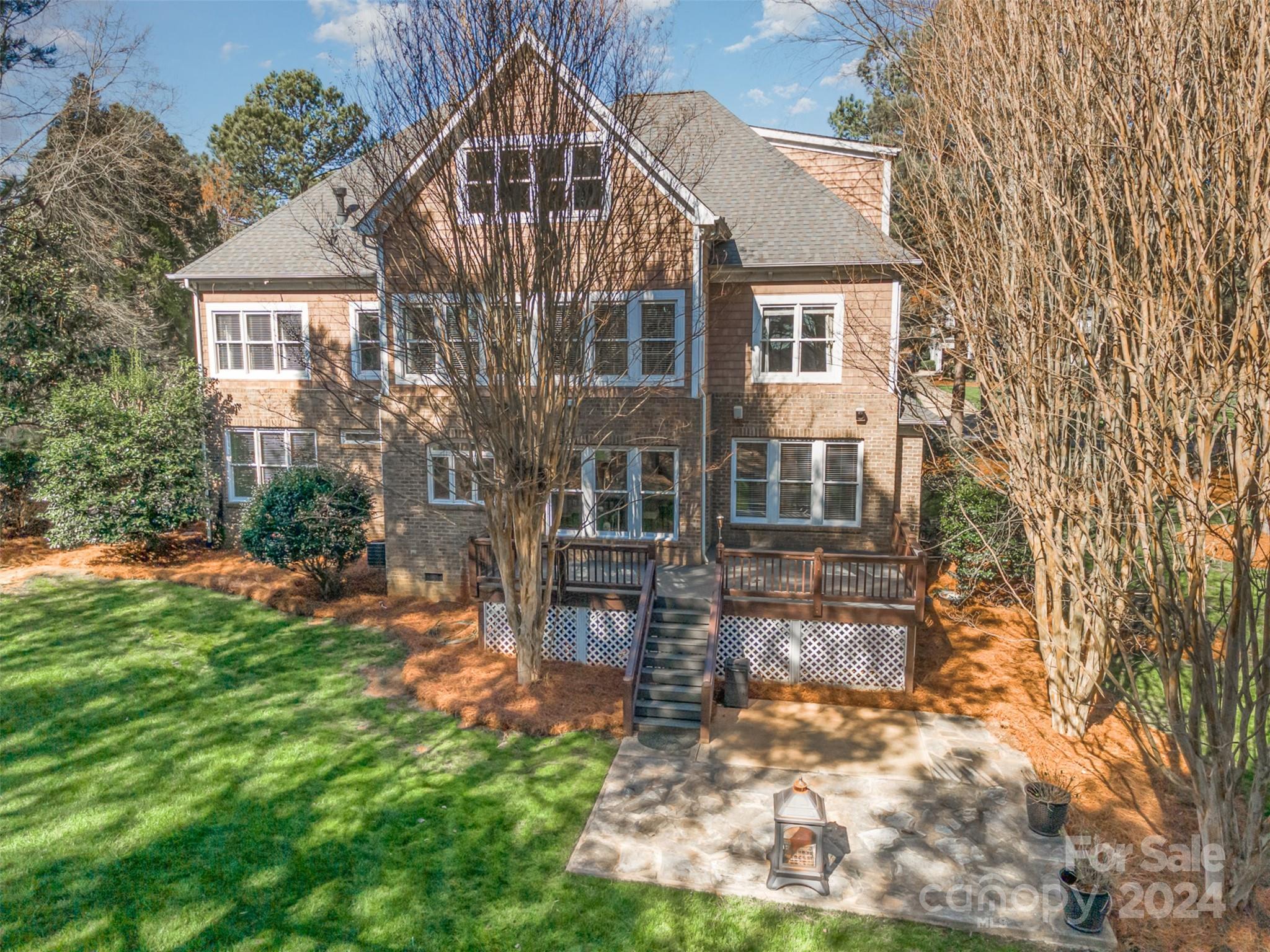 128 Mayfair Road Mooresville, NC 28117 - Photo 28 of 35 front view of a house with a yard