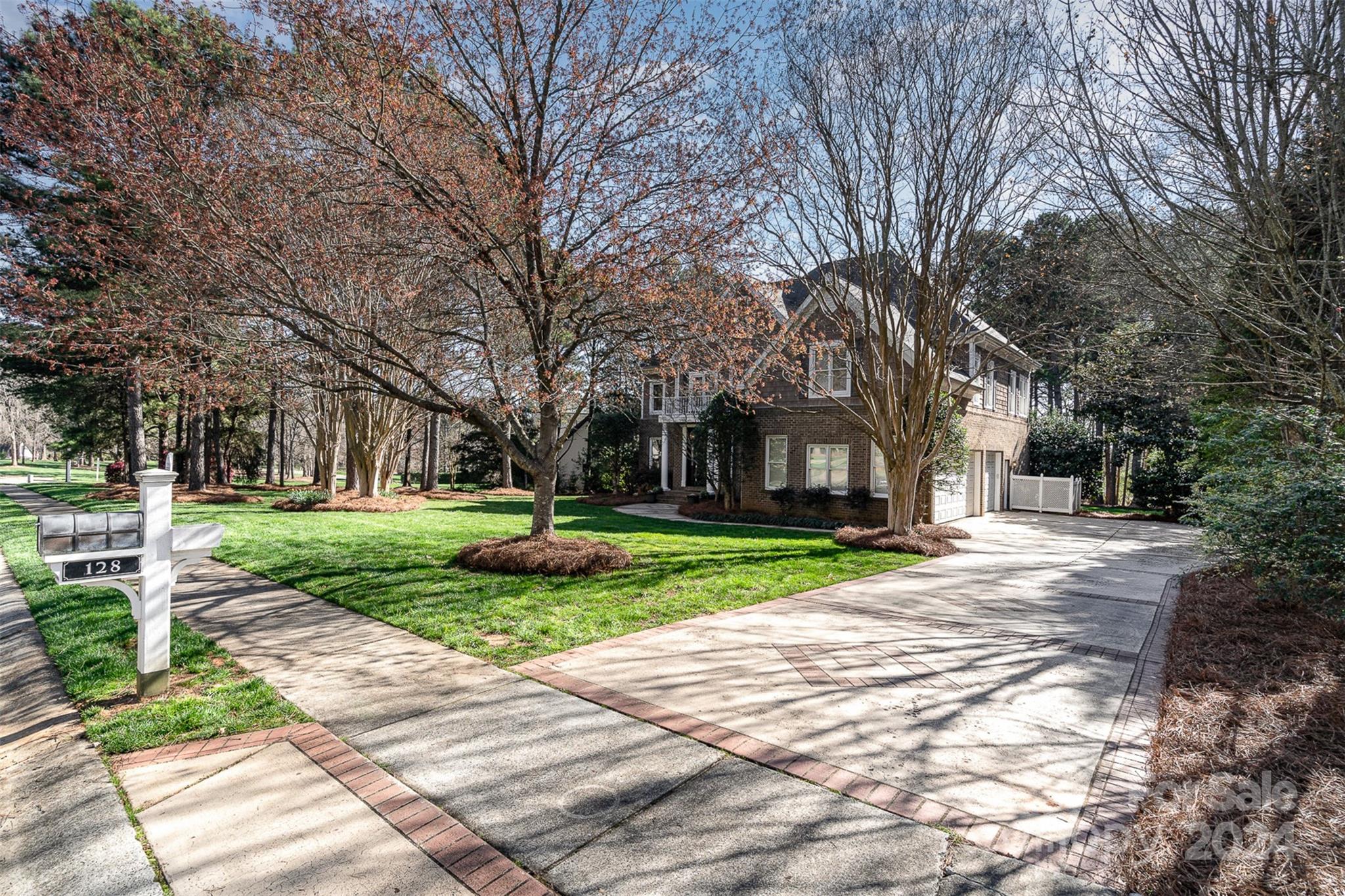 128 Mayfair Road Mooresville, NC 28117 - Photo 29 of 35 a view of a yard with plants and trees