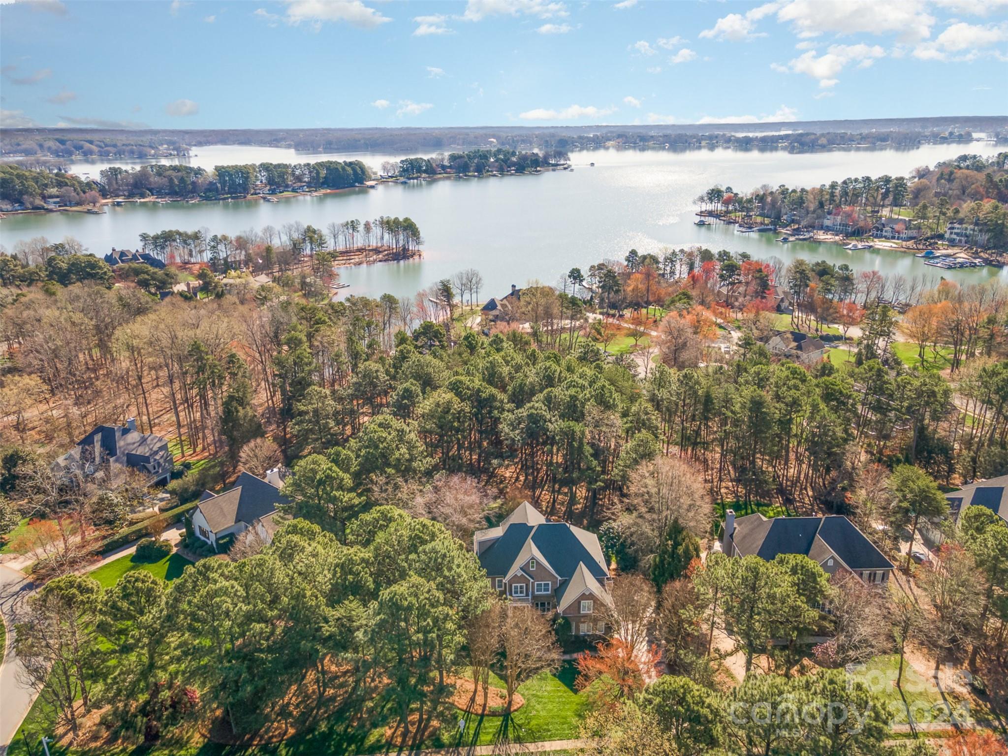 128 Mayfair Road Mooresville, NC 28117 - Photo 33 of 35 a view of a lake with a city