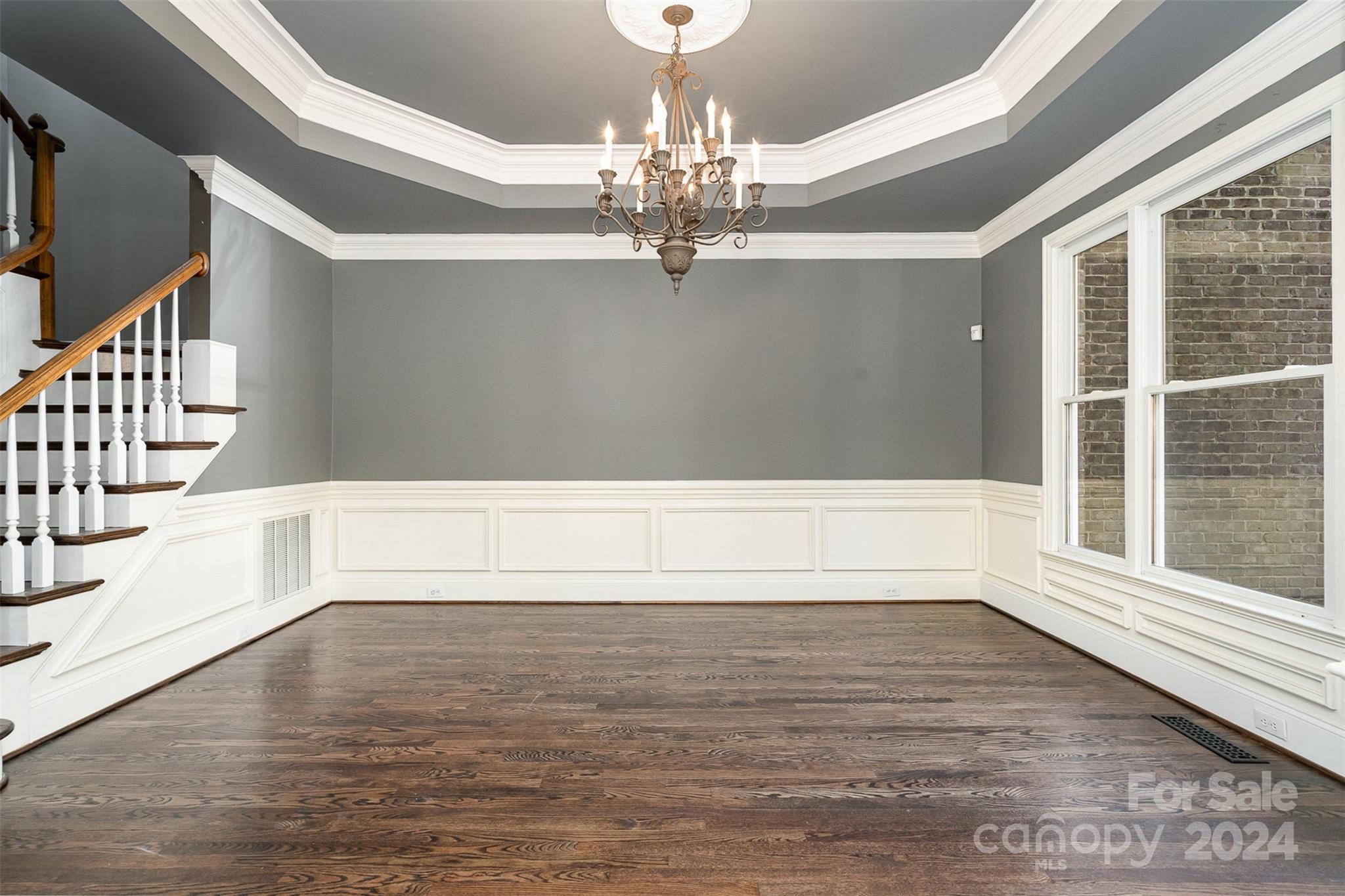 128 Mayfair Road Mooresville, NC 28117 - Photo 4 of 35 a view of empty room with wooden floor and fan