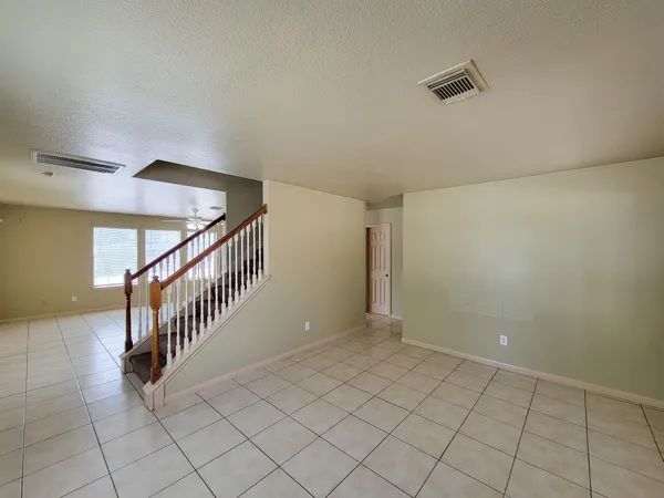 a view of an entryway with stairs