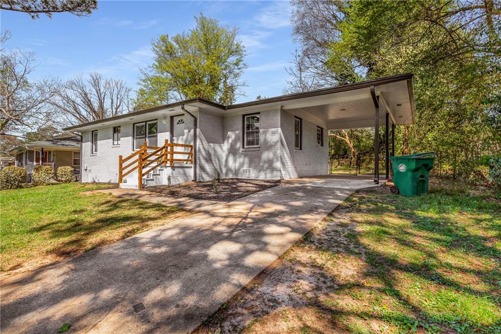 3732 Daisy Drive Decatur, GA 30032 - Photo 1 of 1 a front view of a house with a yard