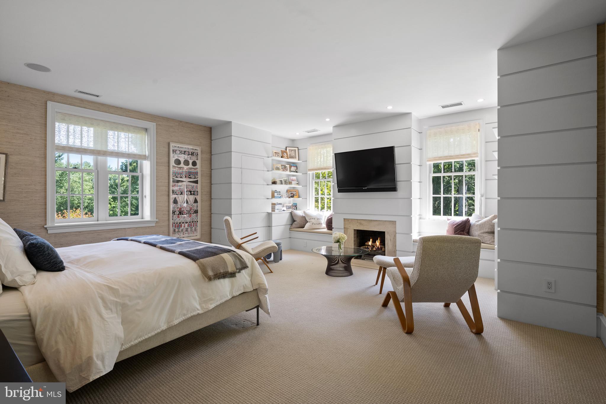 423 North Spring Mill Road Villanova, PA 19085 - Photo 29 of 67 a spacious bedroom with a bed and a couch