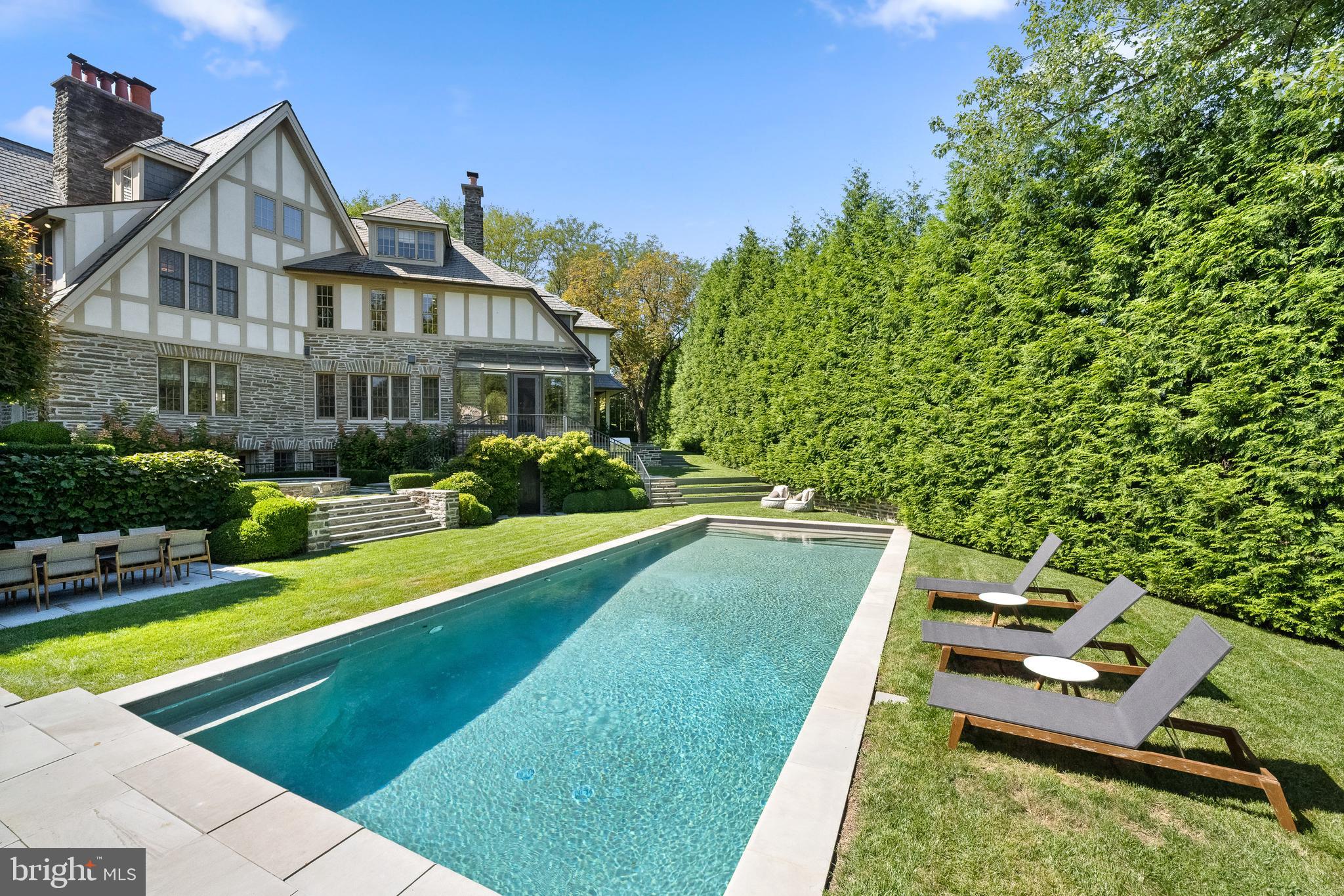 423 North Spring Mill Road Villanova, PA 19085 - Photo 4 of 67 a view of a house with swimming pool
