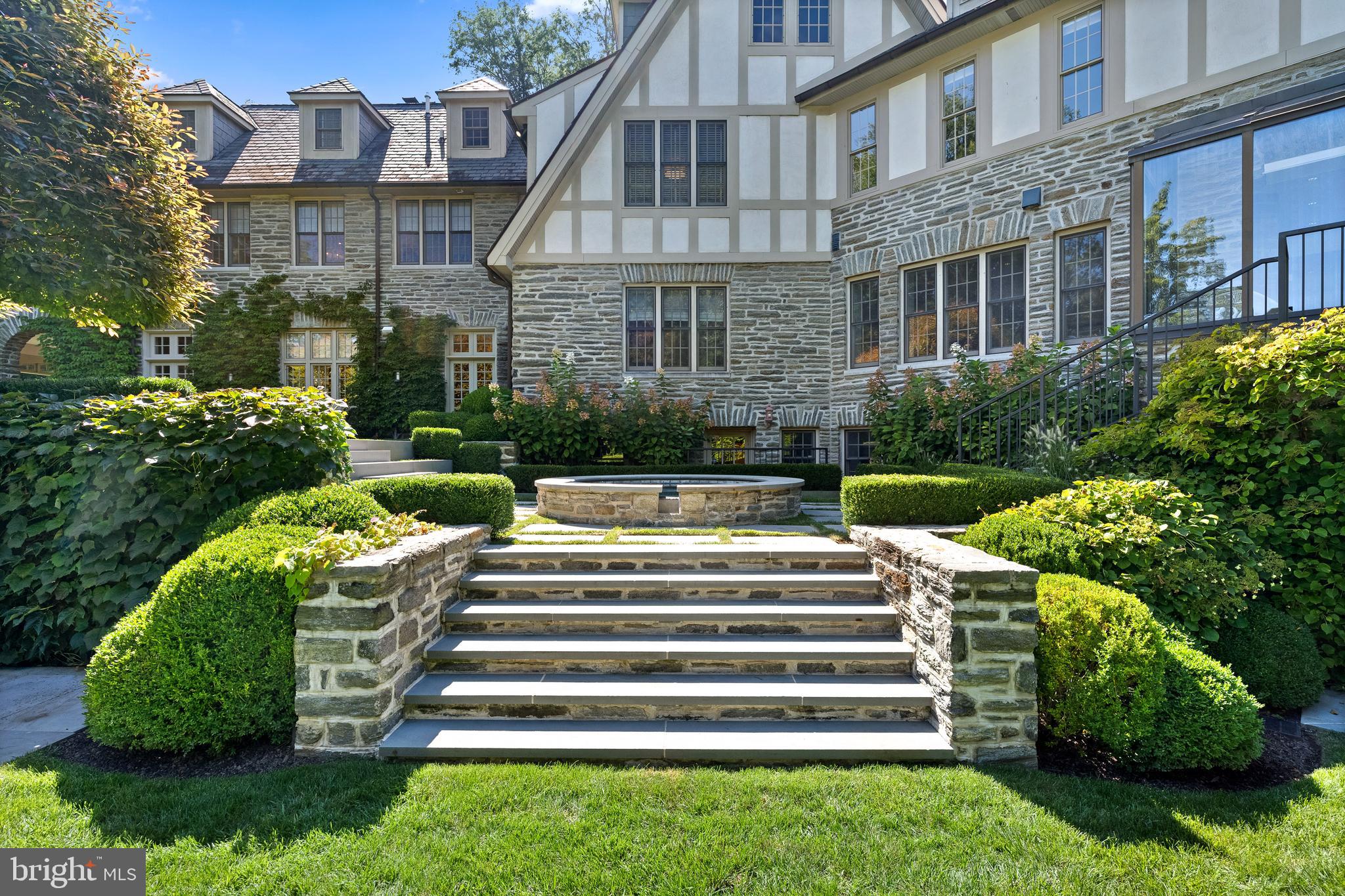 423 North Spring Mill Road Villanova, PA 19085 - Photo 63 of 67 a front view of a house with a yard