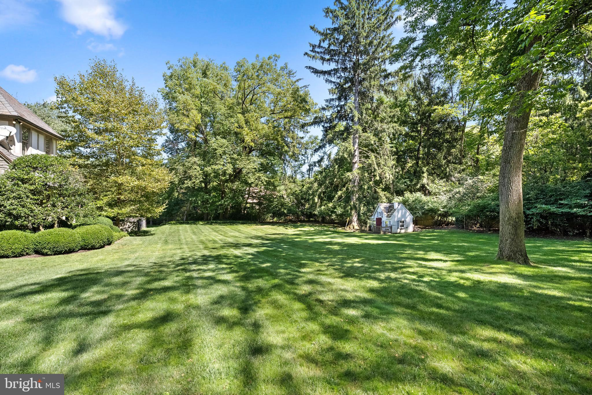 423 North Spring Mill Road Villanova, PA 19085 - Photo 66 of 67 a big yard with lots of green space and trees
