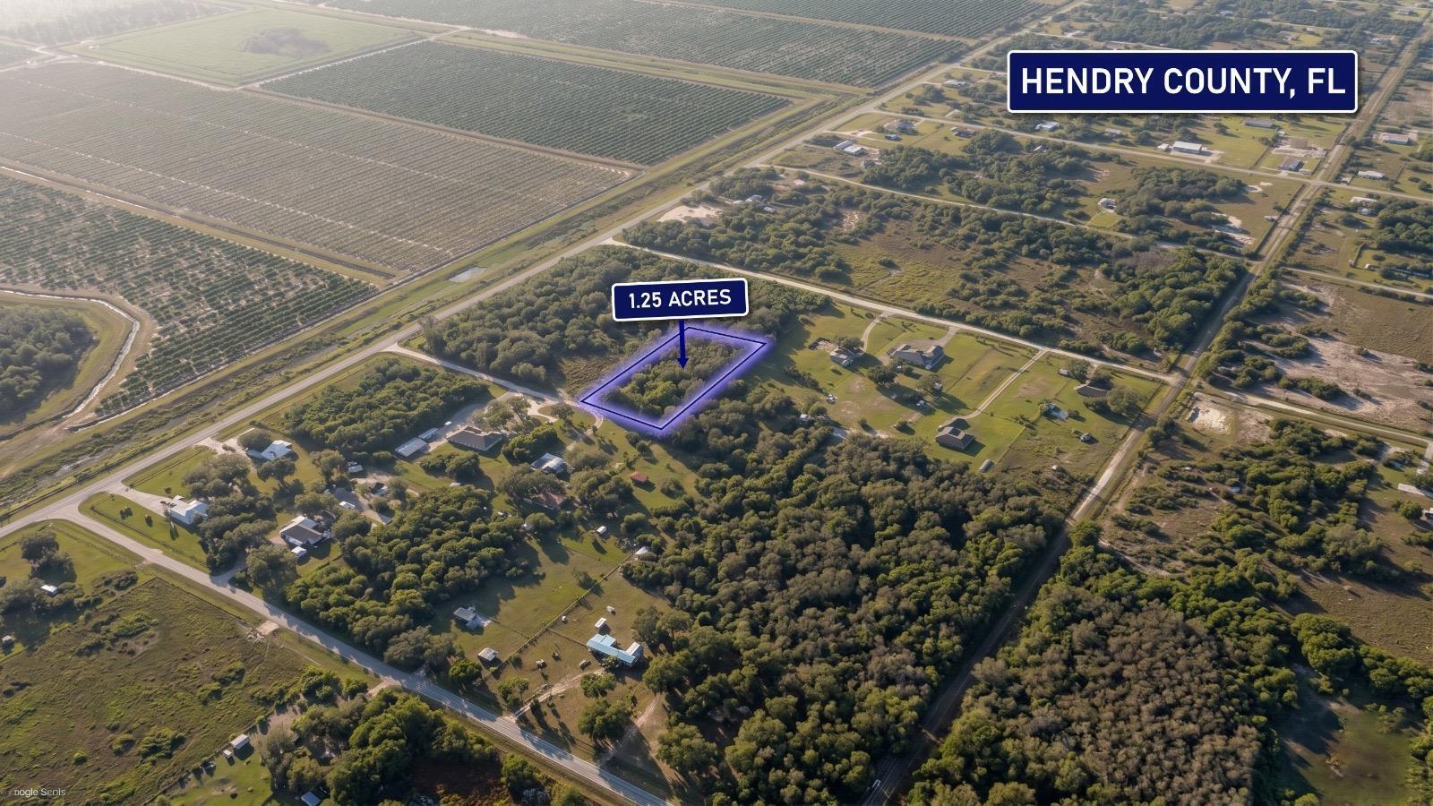 855 North Isora Street Clewiston, FL 33440 - Photo 10 of 10 a sign broad on the side of a street