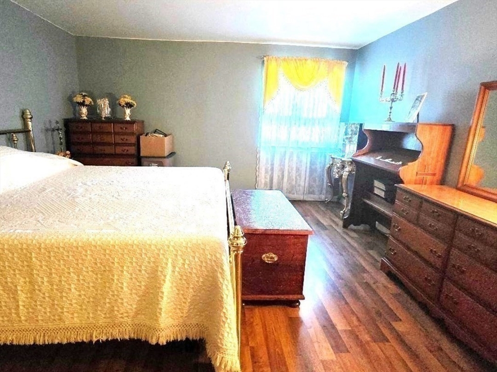 4234 North Main Street, Unit 103 Fall River, MA 02720 - Photo 6 of 10 a living room with furniture and a window