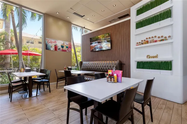 a view of roof deck with patio