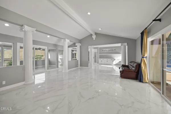 a view of an empty room and window