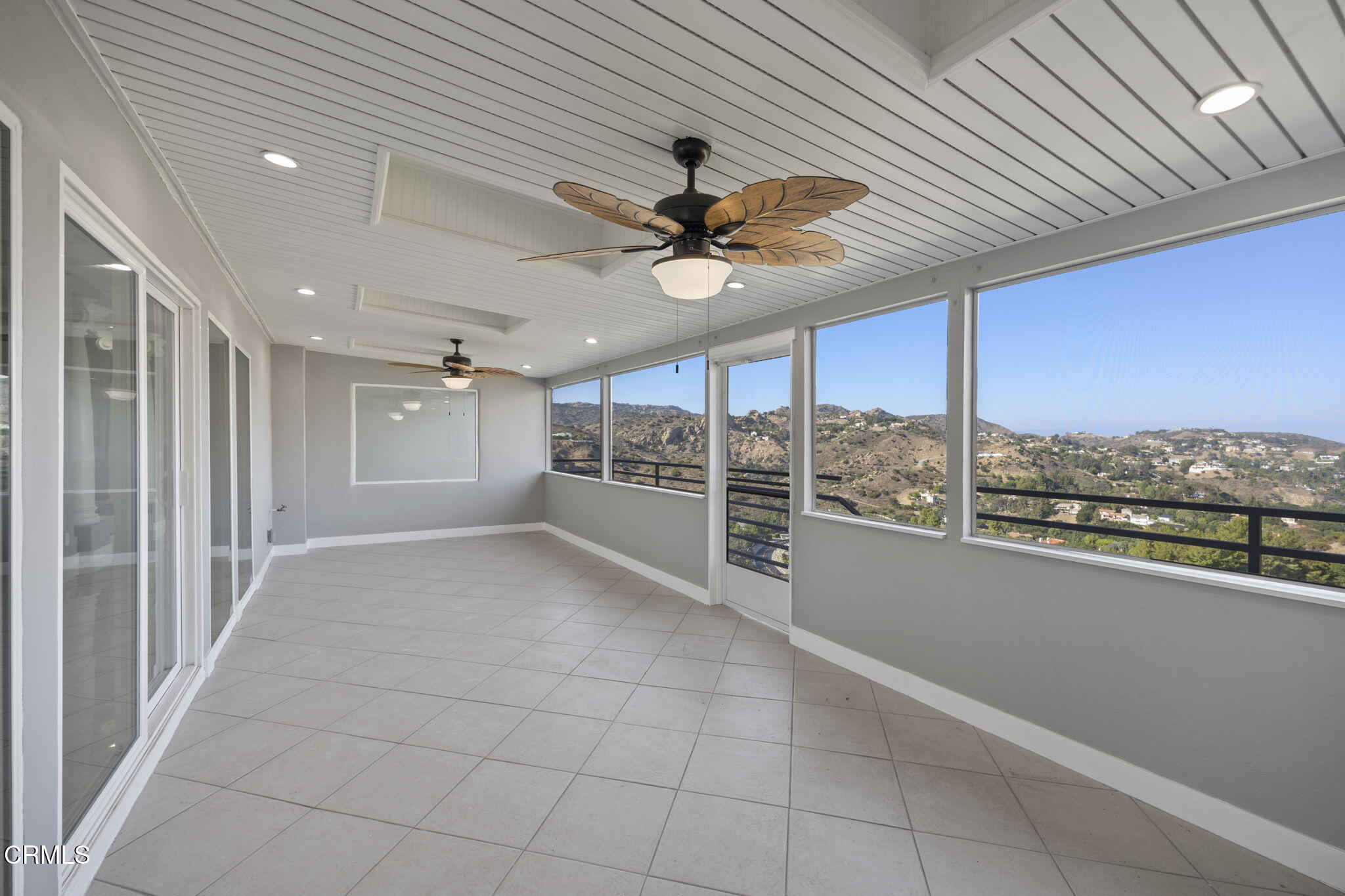 40 Saddlebow Road Bell Canyon, CA 91307 - Photo 17 of 70 a view of a livingroom with a ceiling fan and window
