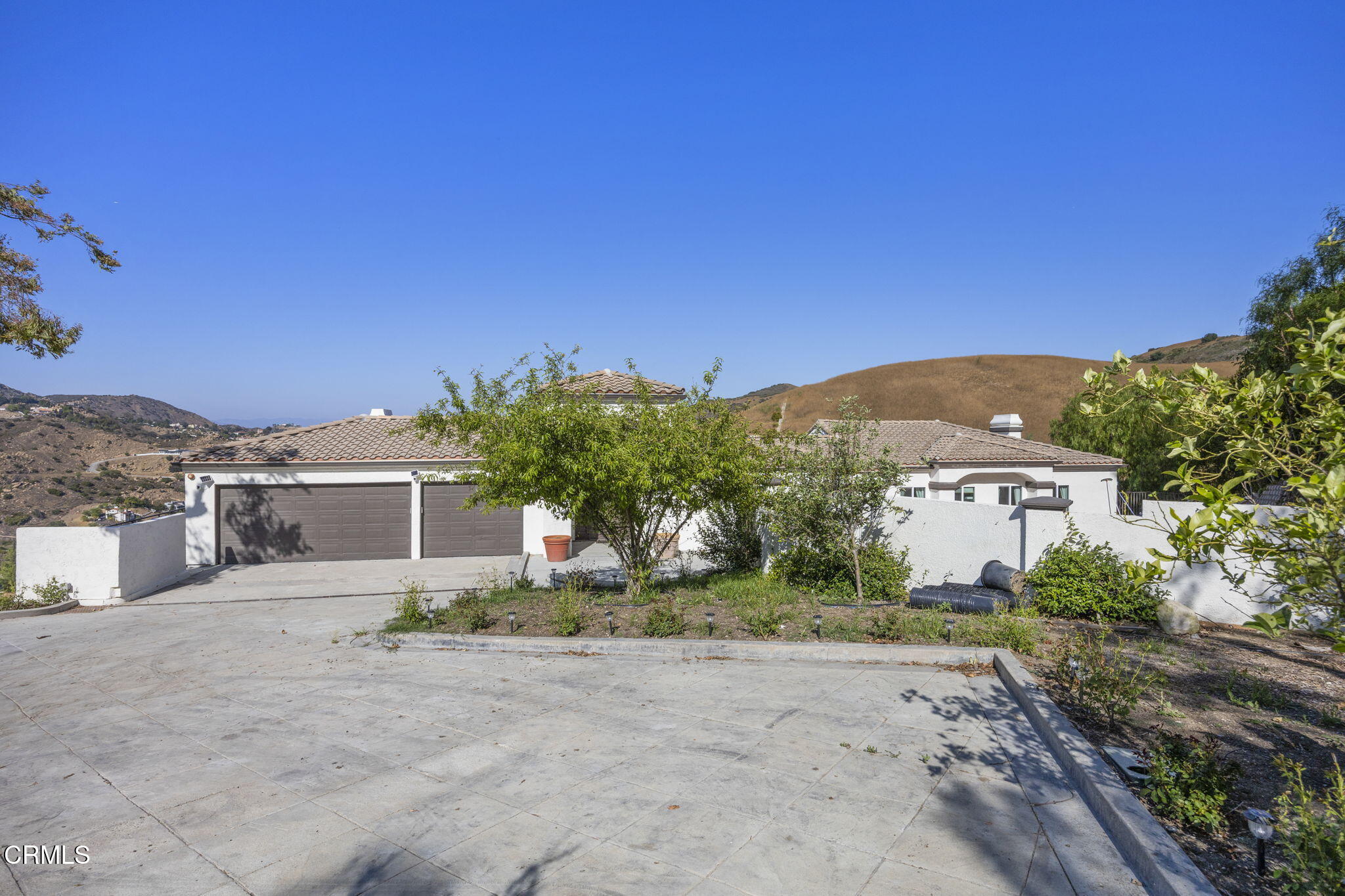 40 Saddlebow Road Bell Canyon, CA 91307 - Photo 2 of 70 a view of a house with a yard and sitting area