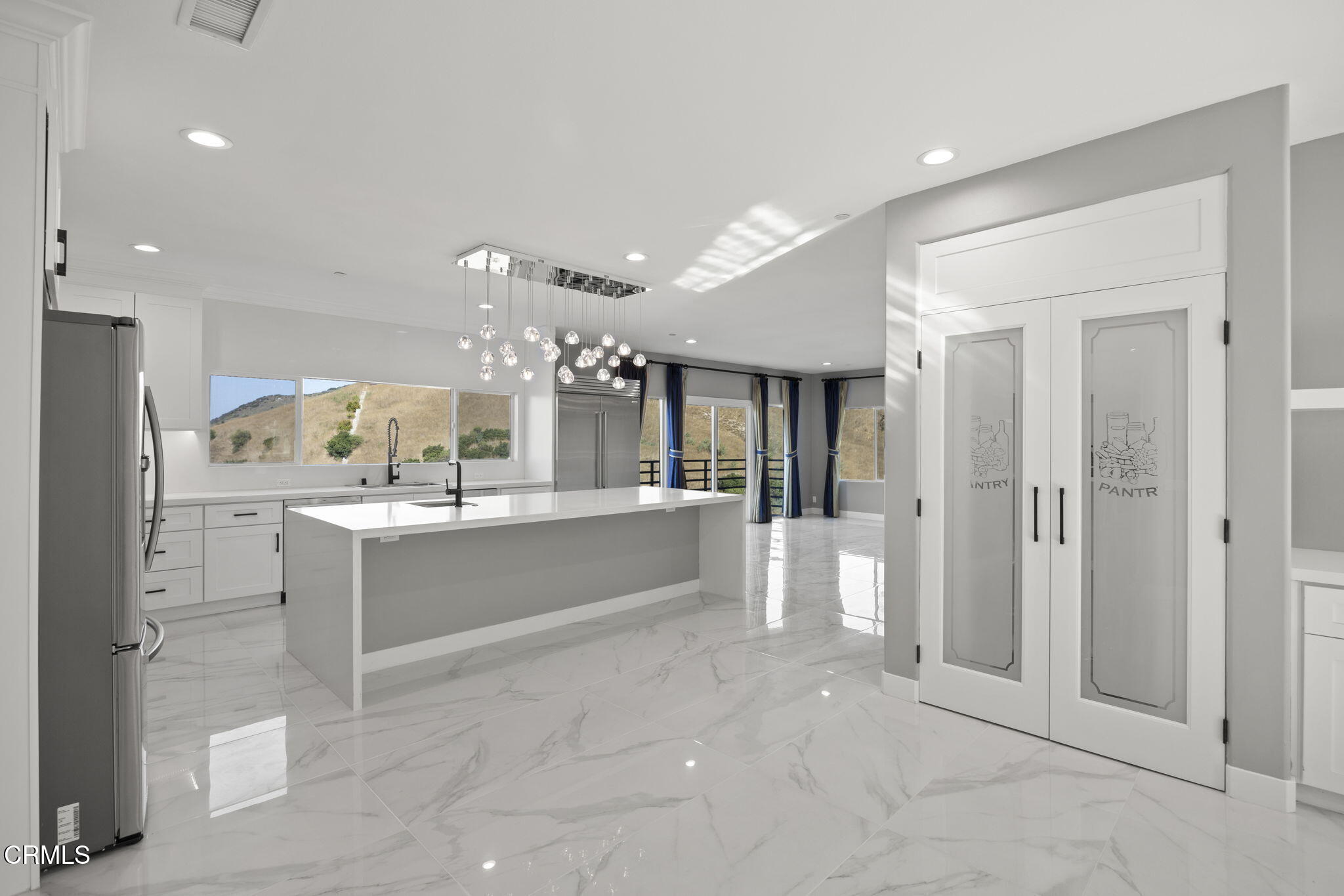 40 Saddlebow Road Bell Canyon, CA 91307 - Photo 21 of 70 a large bathroom with a large mirror vanity and shower