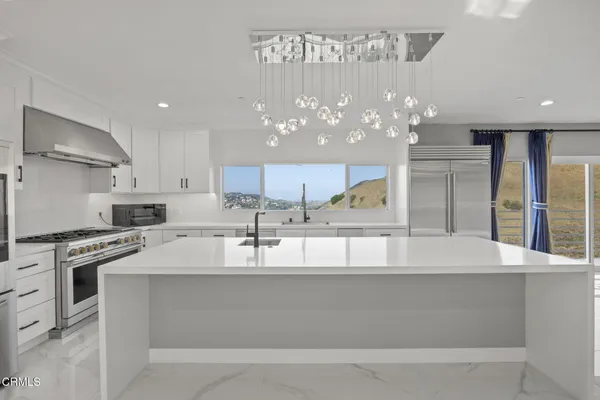 a view of hallway with a large window