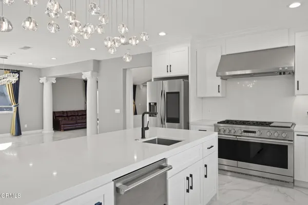 a bathroom with a double vanity sink mirror and