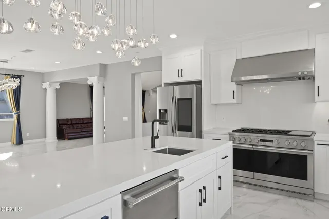 a bathroom with a double vanity sink mirror and