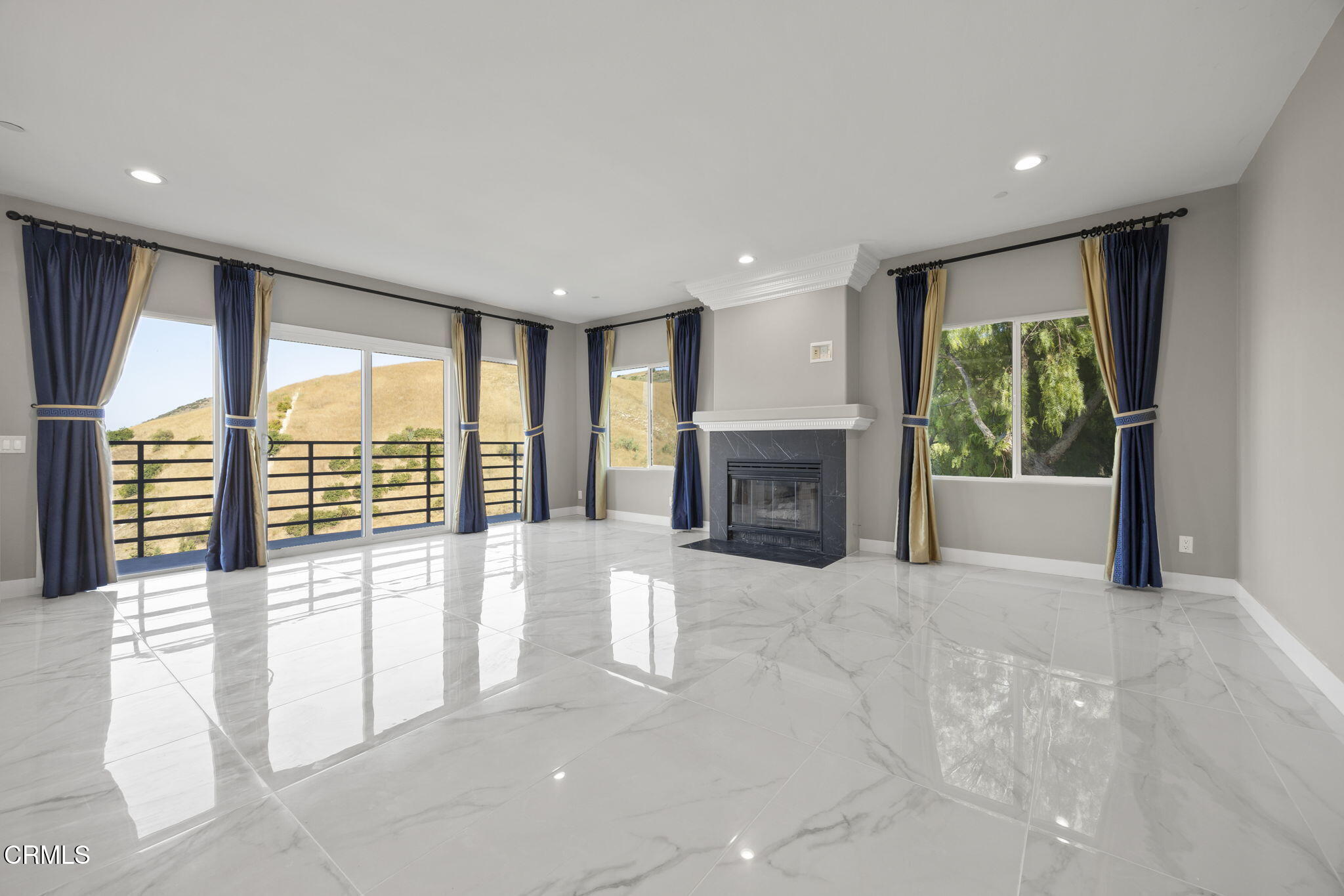 40 Saddlebow Road Bell Canyon, CA 91307 - Photo 28 of 70 a view of an empty room with a fireplace and a window
