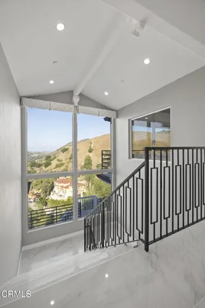a bathroom with a bathtub and a sink