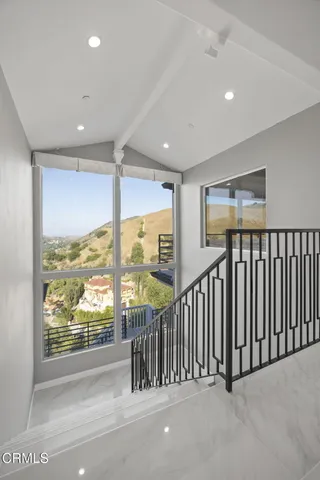 a bathroom with a bathtub and a sink